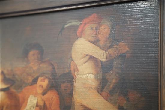 Attributed to Jan Jansz Buesem (Dutch, 1600-c.1649) Revellers in a tavern 11 x 16.5in.